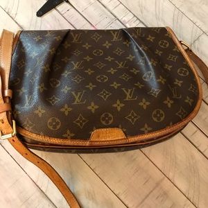 Louis Vuitton
Menilmontant Handbag Monogram Canvas MM